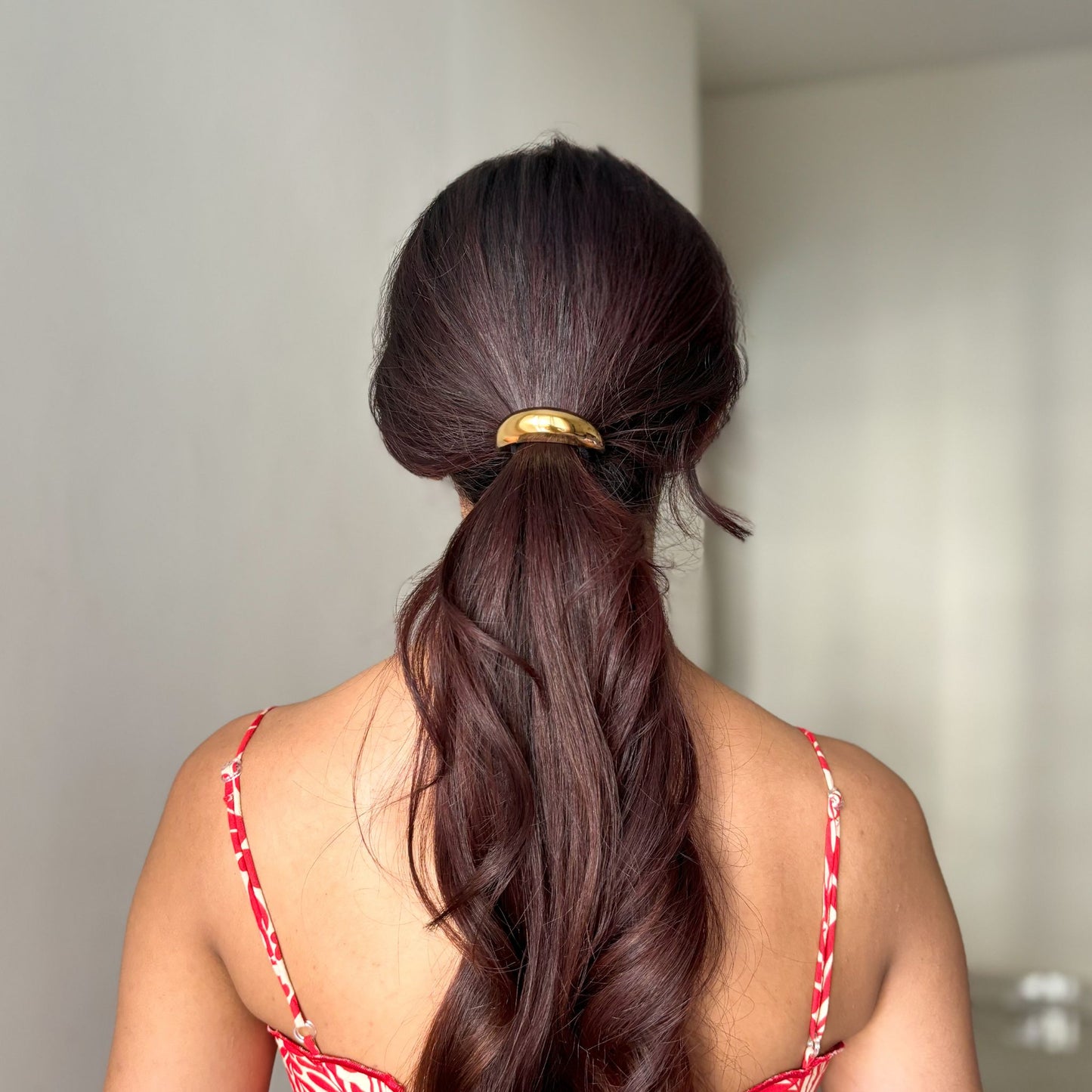 Crescent hair tie